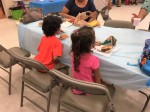 St Andre Back2School Health Fair_Guests enjoy Meal_Jul30'16